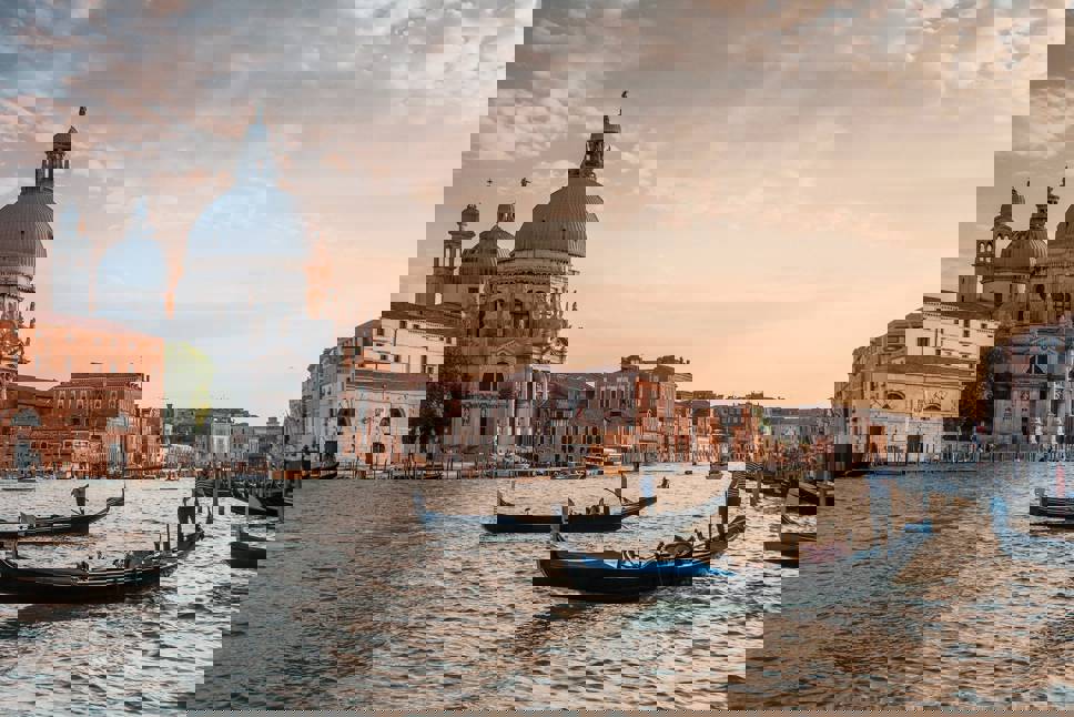 Venice canal with boats and buildings