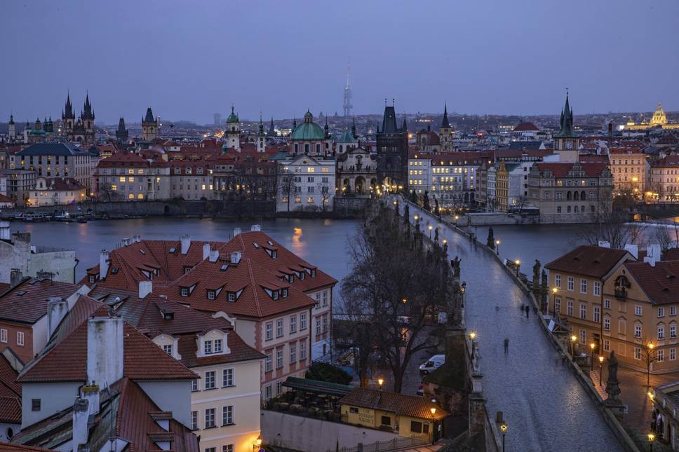 Buildings and bridge in Prague at twilight